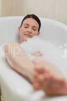 Beautiful woman taking a bath