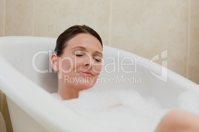 Beautiful woman taking a bath