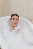 Beautiful woman taking a bath