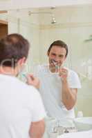 Man brushing his teeth