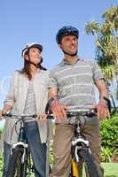 Joyful couple with their bikes