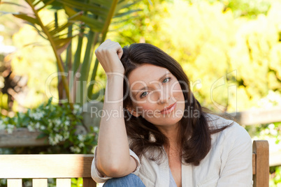 Portrait of a pretty woman in the garden