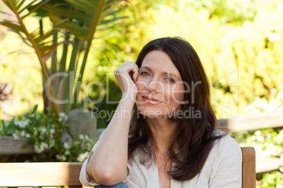 Portrait of a pretty woman in the garden