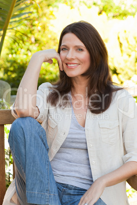Portrait of a lovely woman in the garden