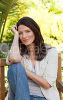 Portrait of a lovely woman in the garden