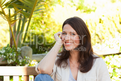 Portrait of a lovely woman in the garden