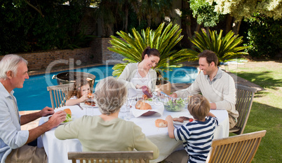 Family eating in the garden