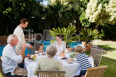 Family eating in the garden