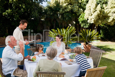 Family eating in the garden