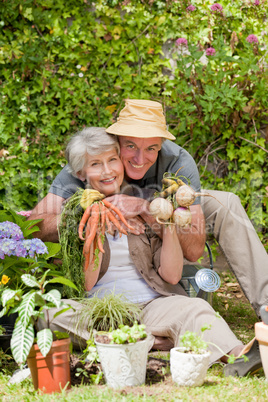 Man hugging his woman in the garden