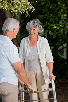 Man with his wife in the garden