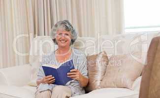 Senior woman reading her book