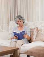 Senior woman reading her book