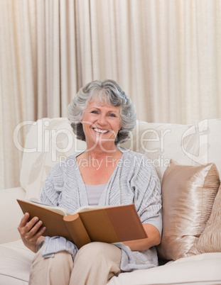 Senior looking at her photo album