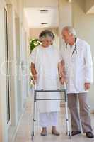 Doctor walking with his patient