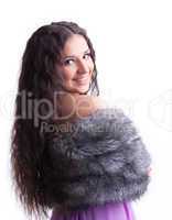 young girl with long hair in fur coat