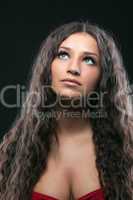 Young beauty girl with long curly hair