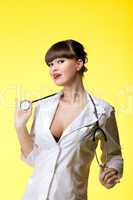 Sexual woman in nurse suit with stethoscope