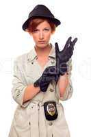 Red Haired Female Detective Putting on Gloves Wearing a Trenchco