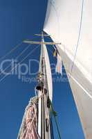 Yacht mast in blue sky