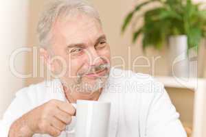 Senior mature man - breakfast coffee at home