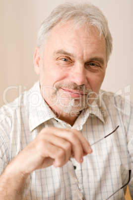 Senior mature man thoughtful  with glasses