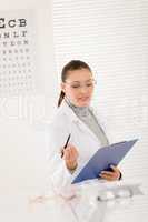 Optician doctor woman with glasses and eye chart