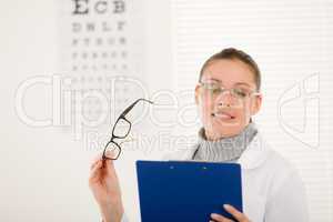 Optician doctor woman with glasses and eye chart