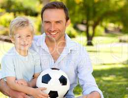 Father with his son after a football game