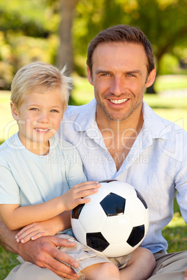Father with his son after a football game