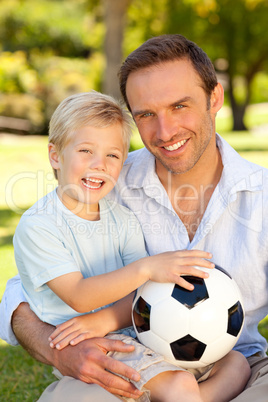 Father with his son after a football game