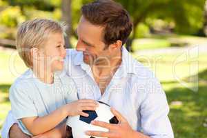 Father with his son after a football game