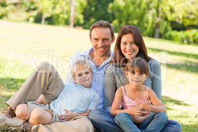 Family sitting in the park