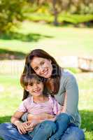 Happy mother with her daughter in the park