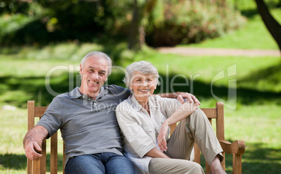 Senior couple sitting on a bench