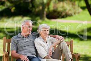 Senior couple sitting on a bench