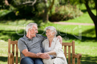 Senior couple sitting on a bench