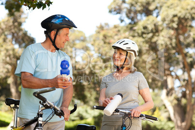 Senior couple drinking water