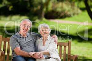 Senior couple sitting on a bench
