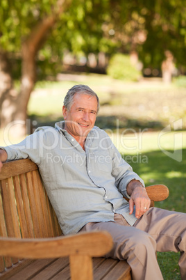 Senior man sitting on a bench