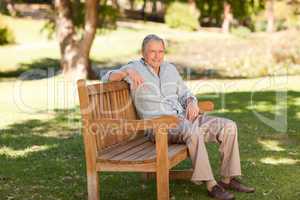 Senior man sitting on a bench
