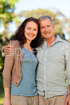Woman with her father-in-law in the park