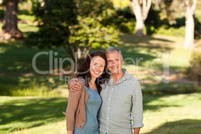 Woman with her father-in-law in the park