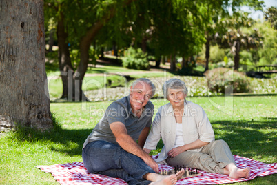 Senior couple  picnicking in the garden