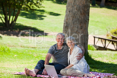 Senior couple  picnicking in the garden