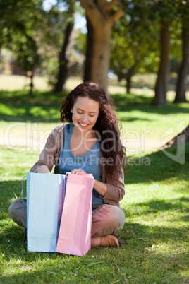Beautiful woman with her shopping bag
