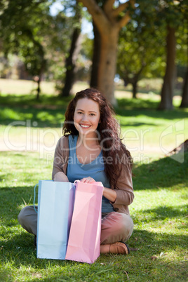 Beautiful woman with her shopping bag