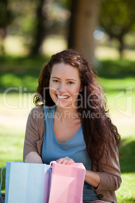 Beautiful woman with her shopping bag