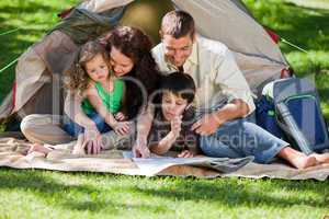 Joyful family camping