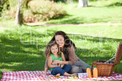 Mother and her daughter picnicking